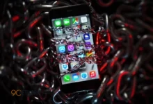 iPhone screen with cybersecurity warning and lock icon