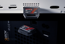 SanDisk Xbox expansion cards inserted into an Xbox Series X console slot.